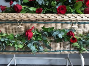 Eco-Friendly Coffin with roses supplied by Albert Parr in Beckenham